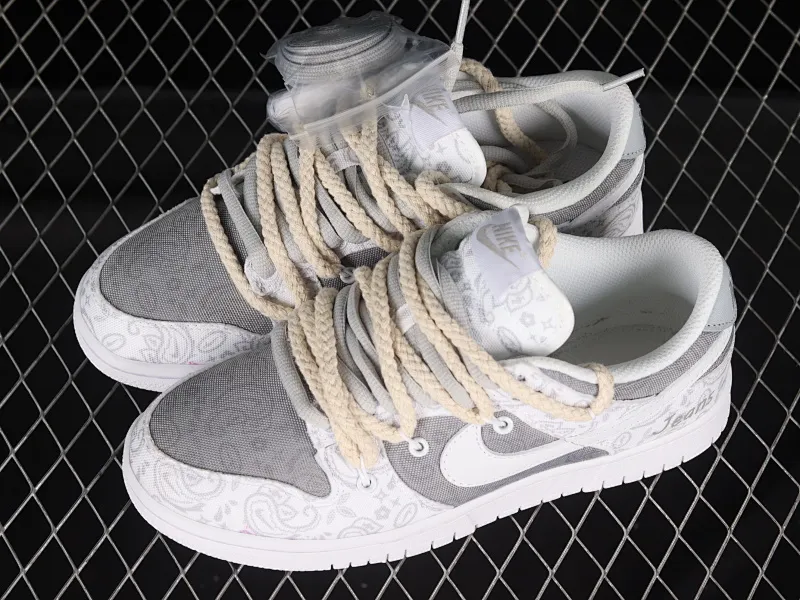 All categories Nk SB Dunk series Nk SB Dunk Low low-top sneakers Nk Dunk Low ESS reverse cashew flower customized version of deconstructed strap casual sneakers DJ9955-100